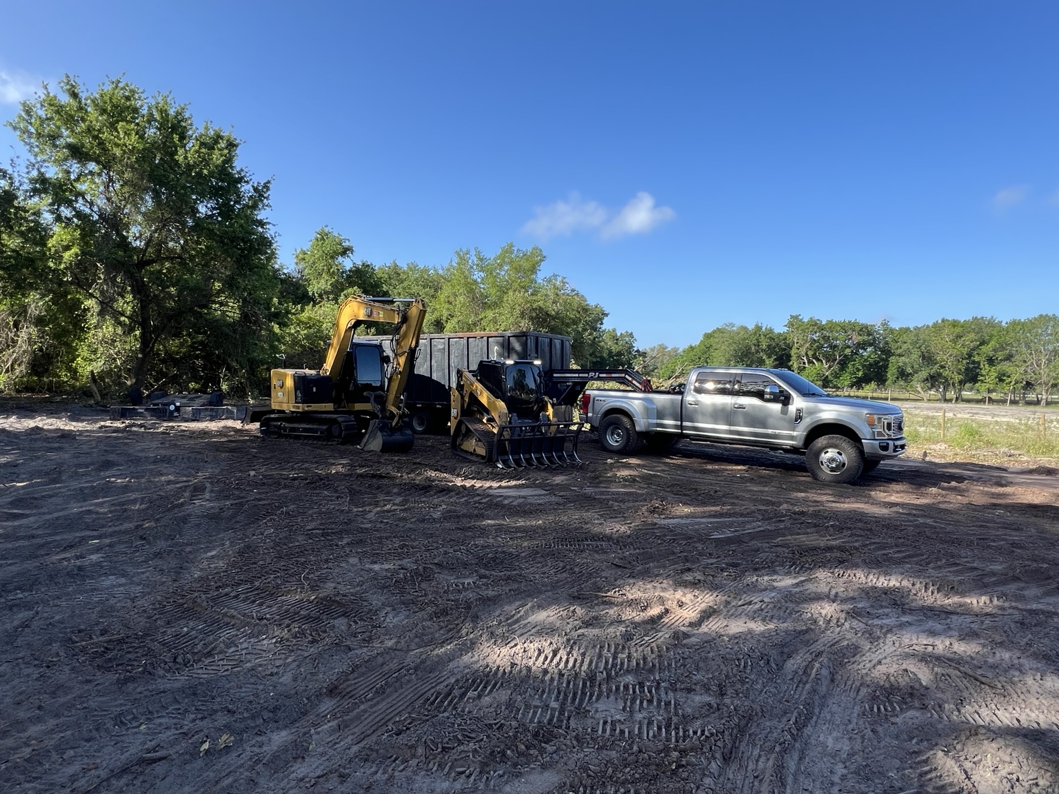 C & S Grading equipment and truck on job site
