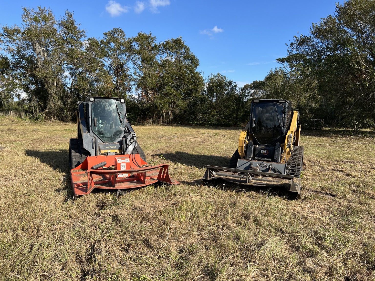 CAT skid steer loading dirt